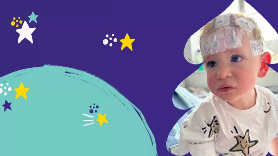 A baby with electrodes on his head is featured on the Big Give campaign, which is also decorated with a star motif.