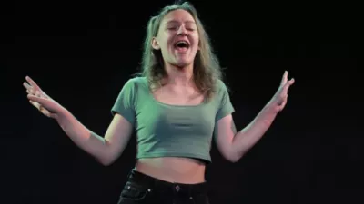 Young girl performing on stage