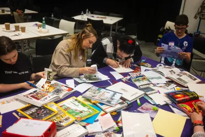 A group of young people create a zine at a Youth Voice Roadshow.