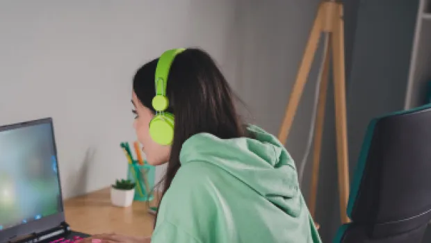 Young girl on her laptop for a Youth Virtual Group