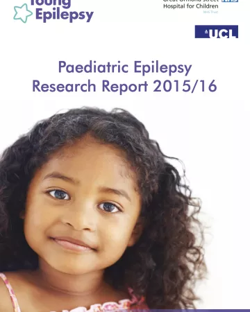 A young girl smiles on the cover of the Research Report 2015-16 cover.