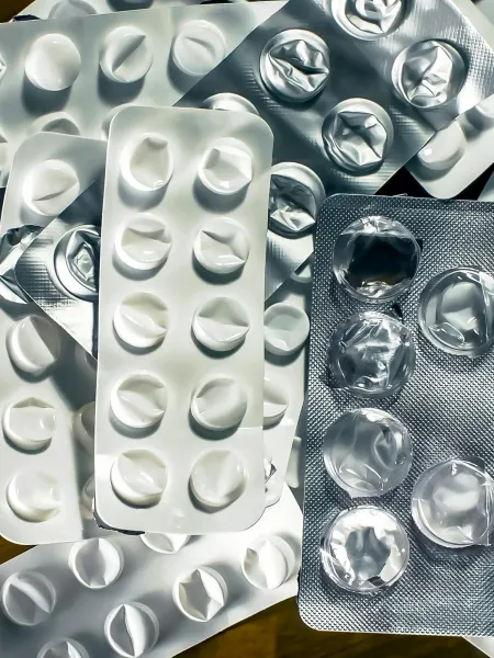 Empty pill packets represent epilepsy medication shortages.