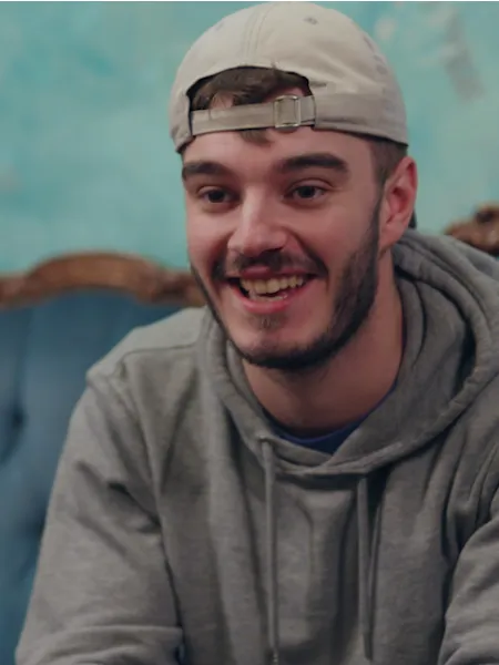 Joe sitting on the sofa